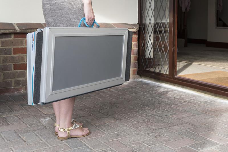 Lady holding an Aerolight access ramp